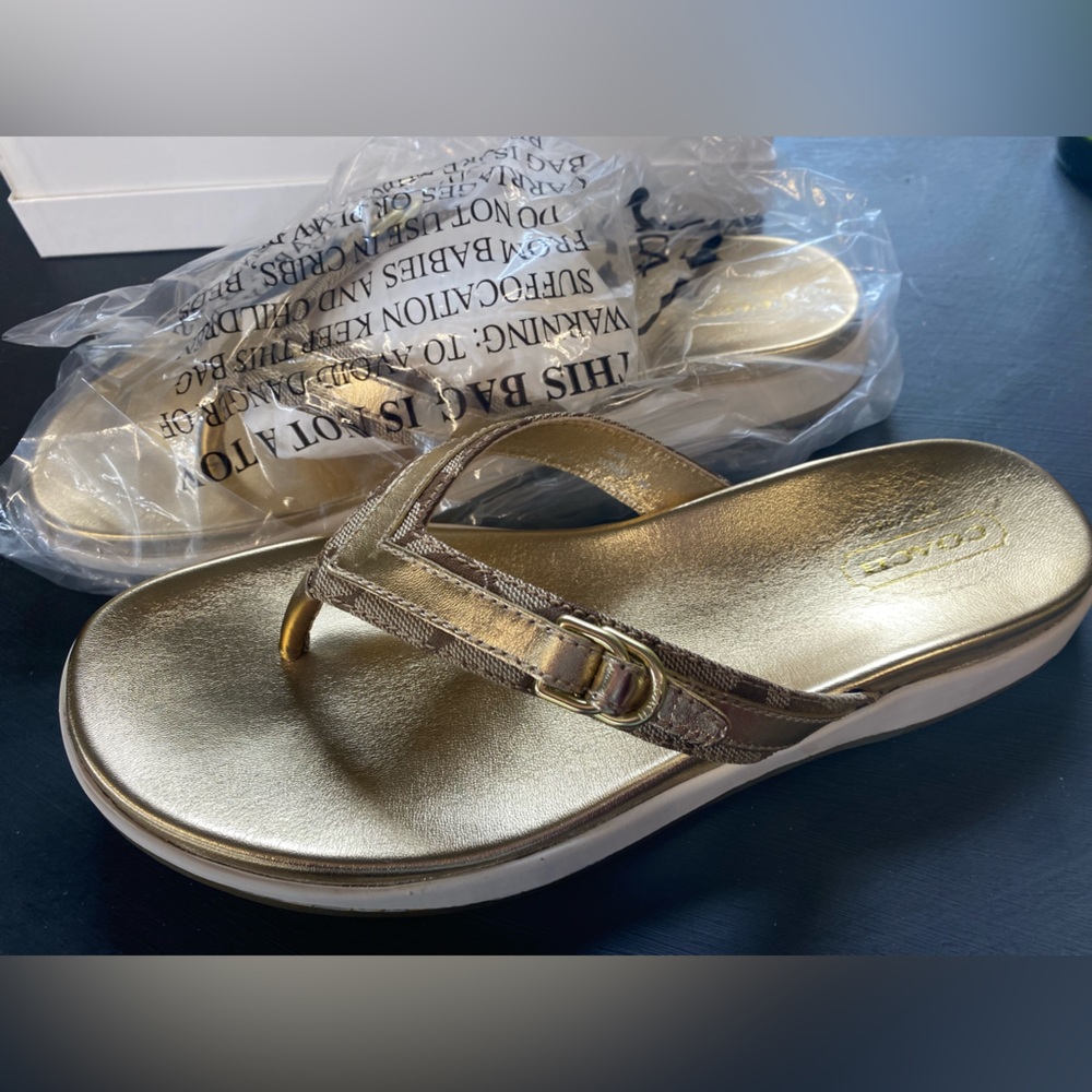 Gold Coach Flip Flops Size 9